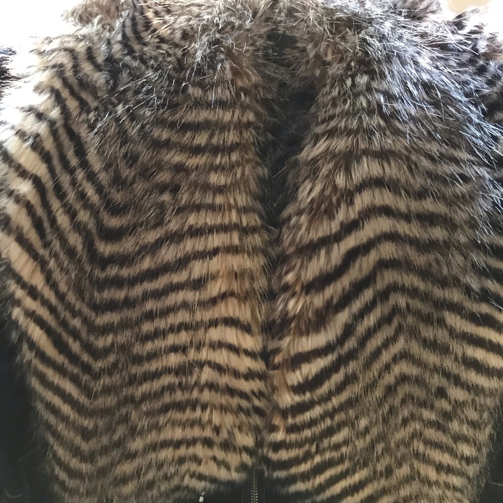 Denim jacket with faux fur. New.